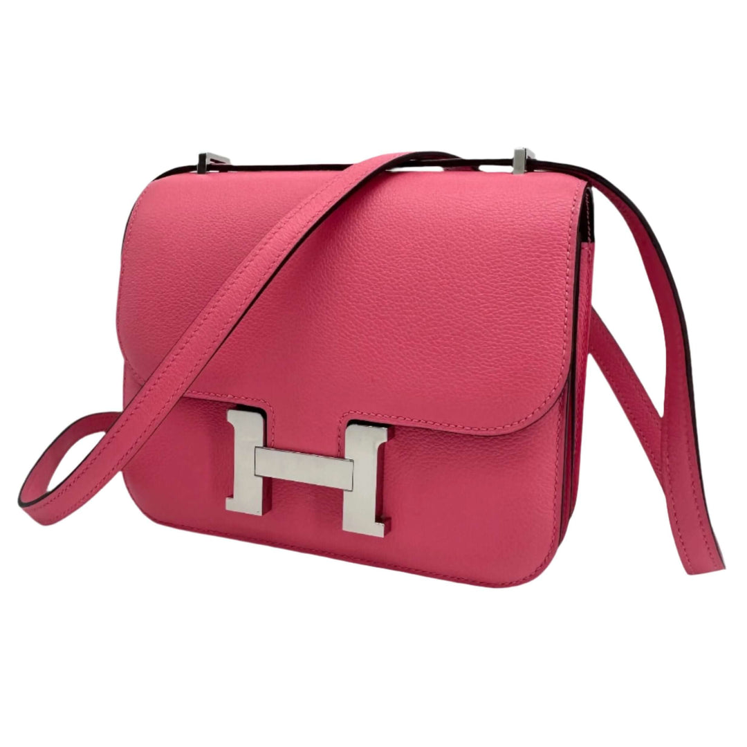 Pink HERMES Epsom Constance 24 shoulder bag with leather strap and signature H clasp.