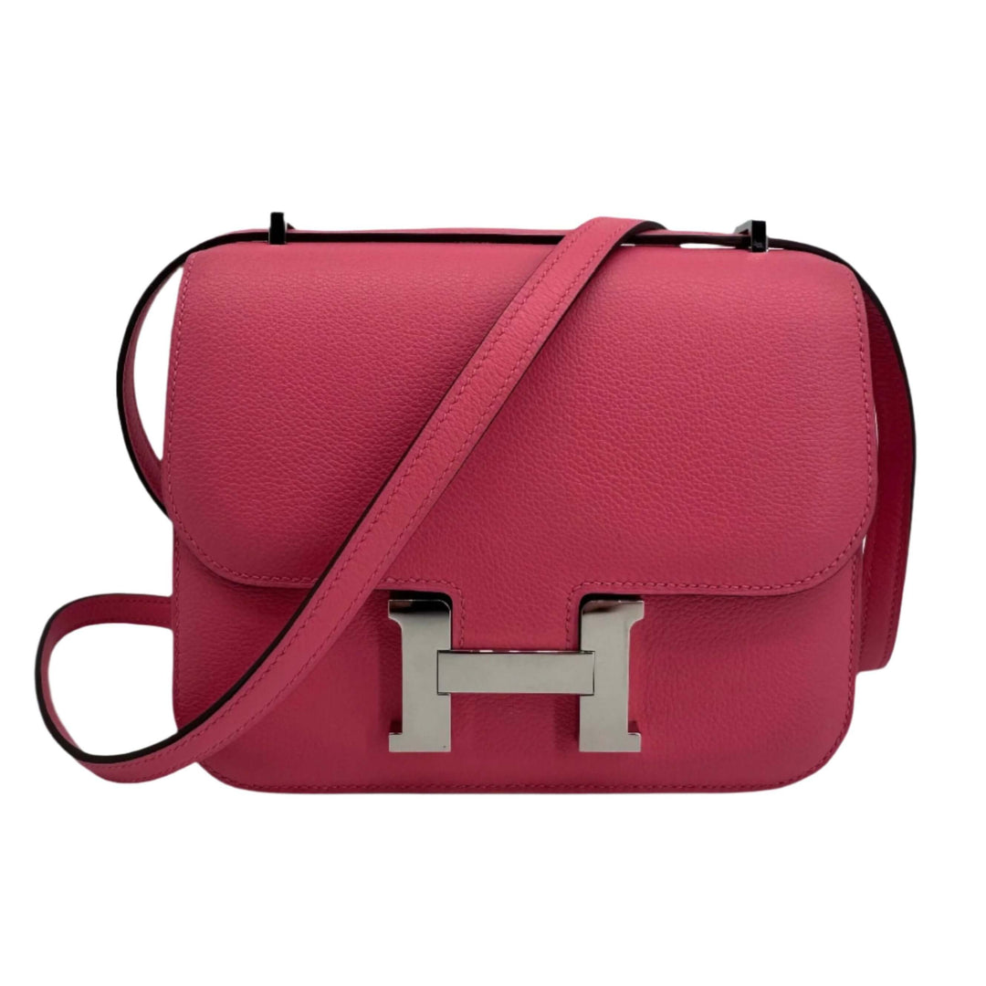 Luxurious Hermes Epsom Constance 24 shoulder bag in pink with iconic H buckle, perfect for elegant styling and sophistication.