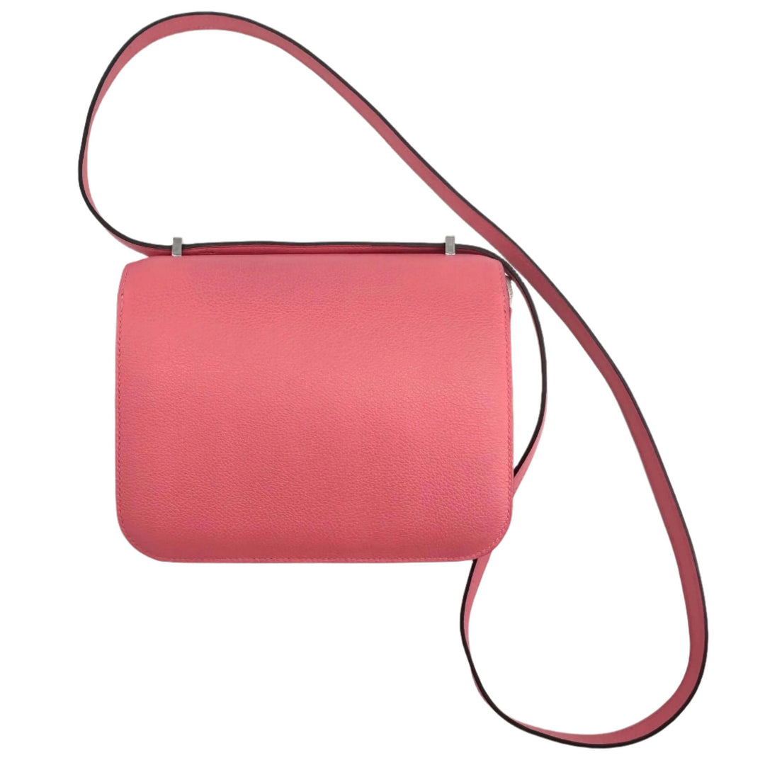 Pink HERMES Epsom Constance 24 Shoulder Bag with elegant design and adjustable strap, perfect for luxury fashion enthusiasts.