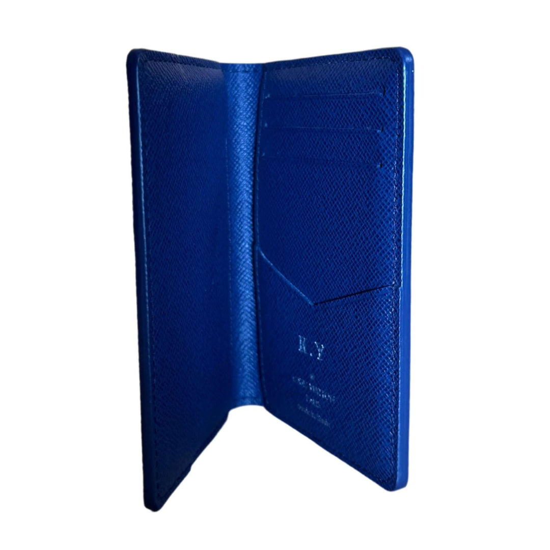 Louis Vuitton blue monogram watercolor pocket organizer with card slots, showcasing luxury design and craftsmanship.