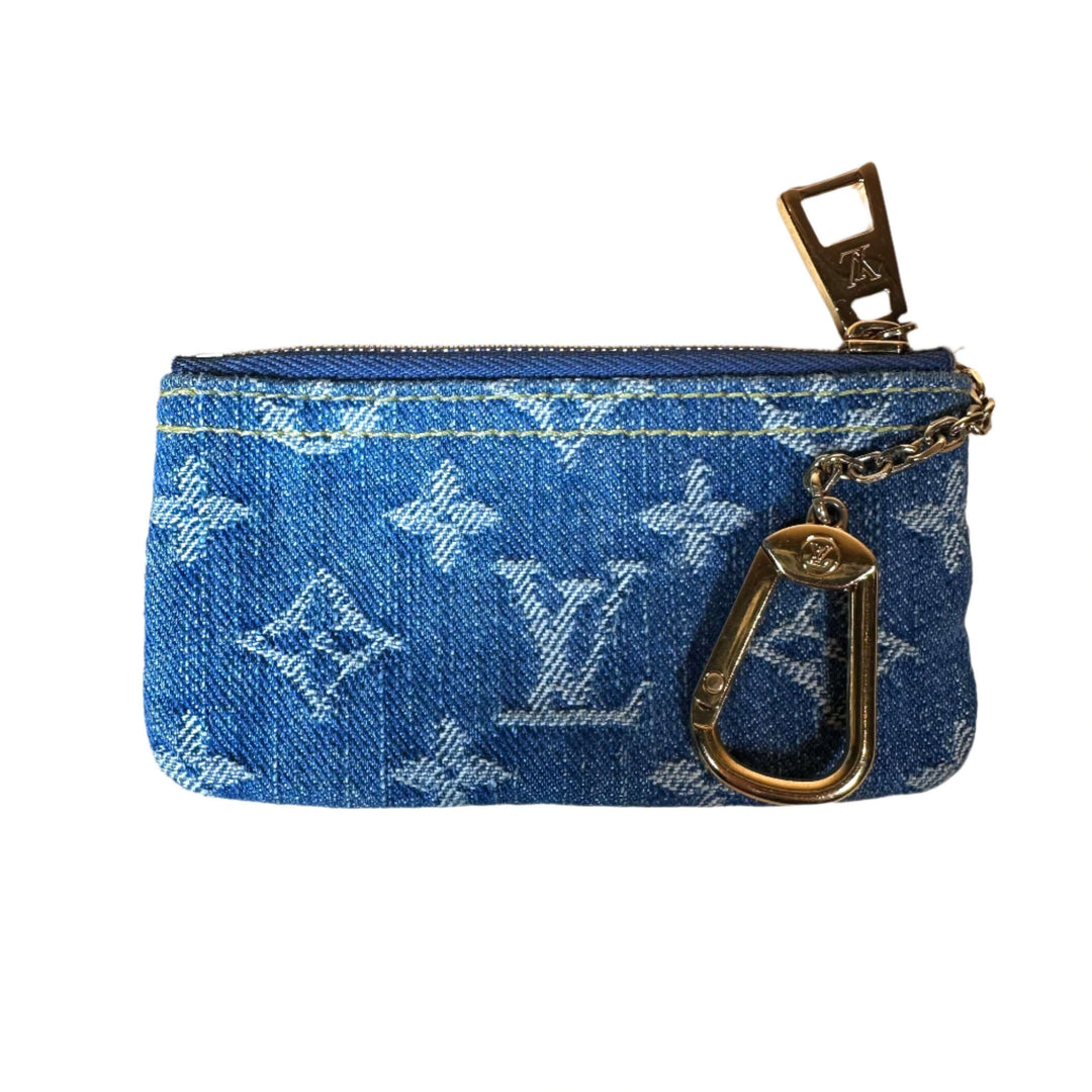 Authentic Louis Vuitton Monogram Denim Key Pouch in Blue with gold-tone zipper and key ring, perfect for everyday essentials.