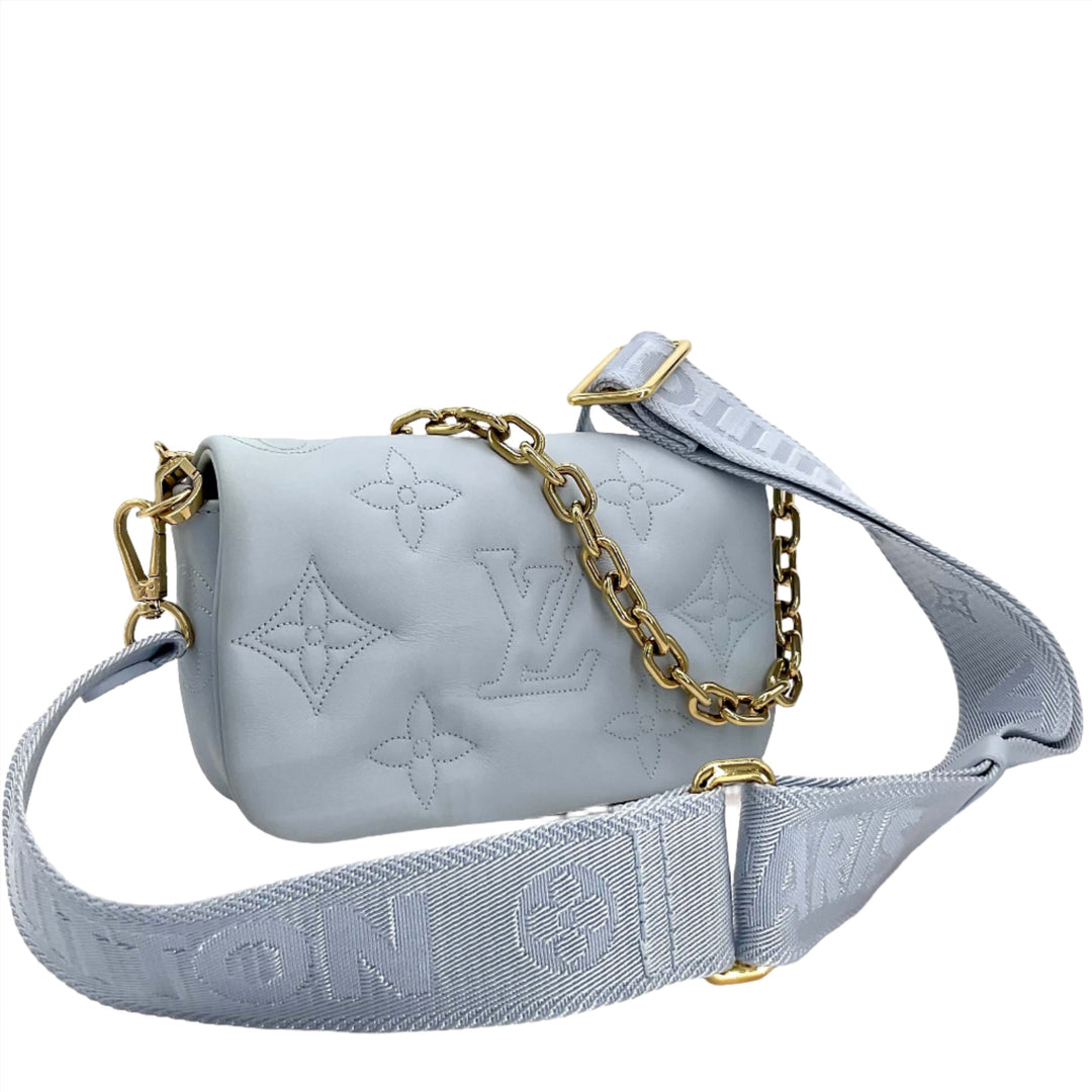 Louis Vuitton Calfskin Bubblegram Wallet On Strap in Ice Blue with monogram design and chain detail.