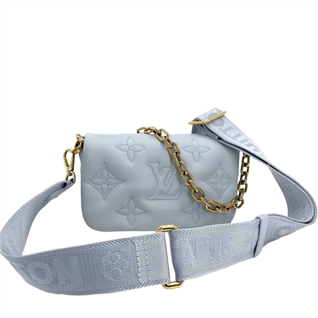LOUIS VUITTON Calfskin Bubblegram Wallet On Strap in Ice Blue with gold chain detail and logo-embossed design.