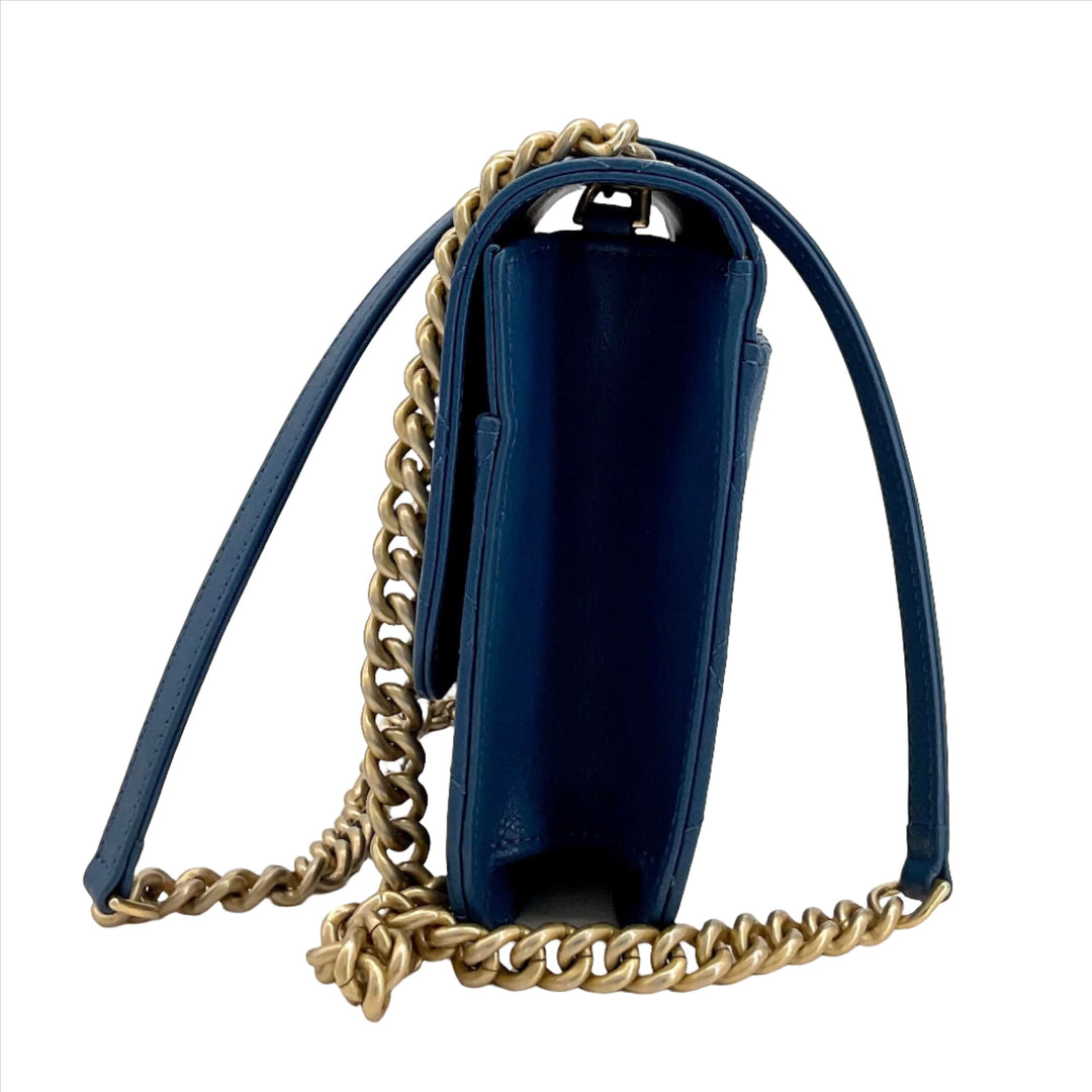 Chanel Mini Chain Front Classic Single Flap Bag in Blue side view with gold chain strap